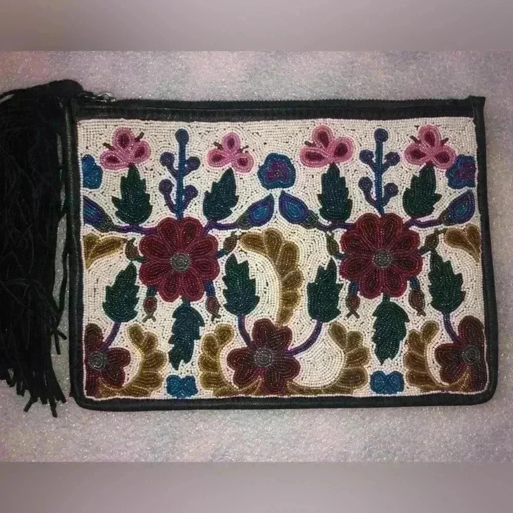 Sam Edelman beaded clutch with Tassel